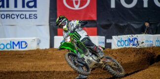 Eli Tomac holds his hands up on the collision with Blake Baggett Eli Tomac