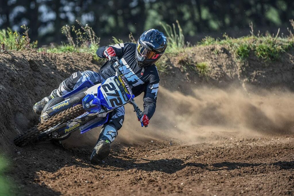 Neville Bradshaw absolutely destroying berms on his YZ250 twostroke