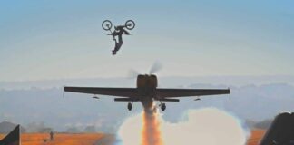 Video: Dirtbike backflips over aerobatic plane